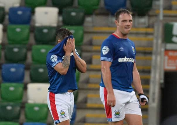 Linfield's Jordan Stewart and Jamie Mulgrew disappointed after their Champions League defeat to Rosenborg. Picture by Colm Lenaghan/Pacemaker Press