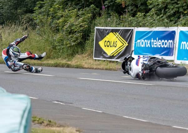 Michael Dunlop's crash during the Senior race at Thursday's Southern 100 meeting in the Isle of Man.
 Pic by Pacemaker.