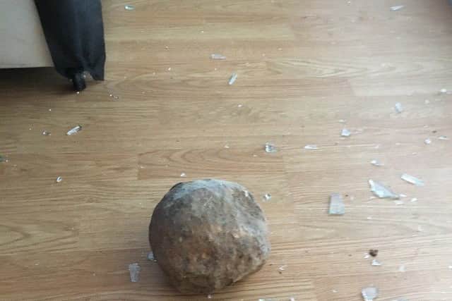 The stone which flew through the window