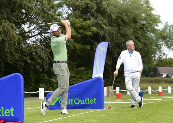 Pacemaker Press 16-07-2019: Official re-launch of the Golf Outlet at Knockbracken Golf Centre in Belfast. European Tour Professional, Sky Sports presenter and Chairman of the European Tour player's committee, David Howell, will was there to mark the event. David is joined by Clubs to Hire founder and Chief Executive Tony Judge.
Picture By: Arthur Allison.