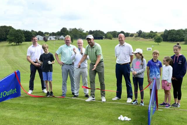 Pacemaker Press 16-07-2019: Official re-launch of the Golf Outlet at Knockbracken Golf Centre in Belfast. European Tour Professional, Sky Sports presenter and Chairman of the European Tour player's committee, David Howell, will was there to mark the event. David is joined by Clubs to Hire founder and Chief Executive Tony Judge.
Picture By: Arthur Allison.