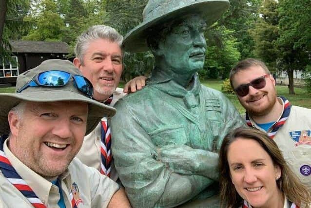 Unit leader Phil Maxwell with his assistants Dave Orr, Adam Clements and deputy Bronagh McAuley. A statue of Scout founder Baden Powell is in the centre.
