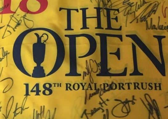 Ben's Open flag had been signed by around 30 golf stars, including Graeme McDowell, Darren Clarke and Francesco Molinari.