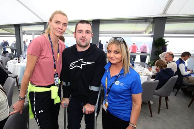 Jodie Kidd, Michael Dunlop and Susie Brown pictured at the Tourism NI hospitality at Royal Portrush. Picture Matt Mackey / Press Eye