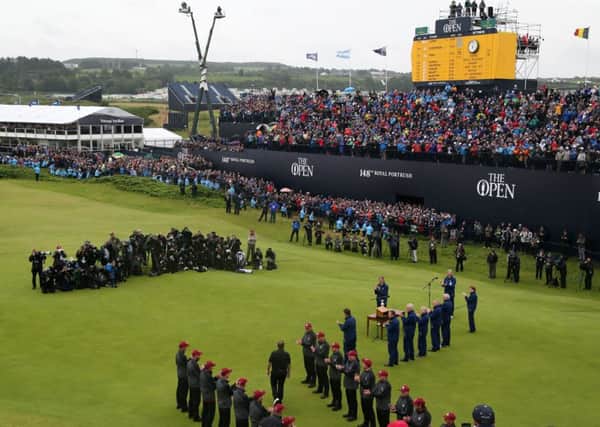 Shane Lowry walks out to receive the Claret Jug after winning The Open Championship 2019 at Royal Portrush Golf Club. Photo: Richard Sellers/PA Wire. The Open website is TheOpen.com