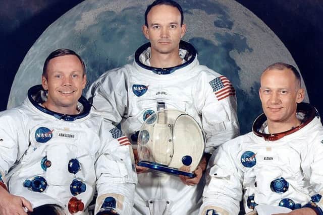 Neil Armstrong (left) with fellow Apollo 11 astronauts Michael Collins (centre) and Edwin Buzz Aldrin