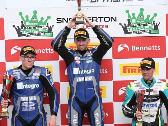 Jack Kennedy celebrates victory at Snetterton with runner-up Brad Jones (left) and Alastair Seeley. Picture: David Yeomans.