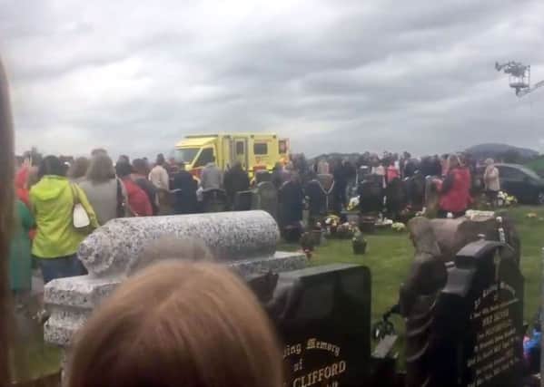 Videograbbed image taken with permission from a video posted on twitter of the scene in St Patrick's cemetery, Dowdallshill in Dundalk
