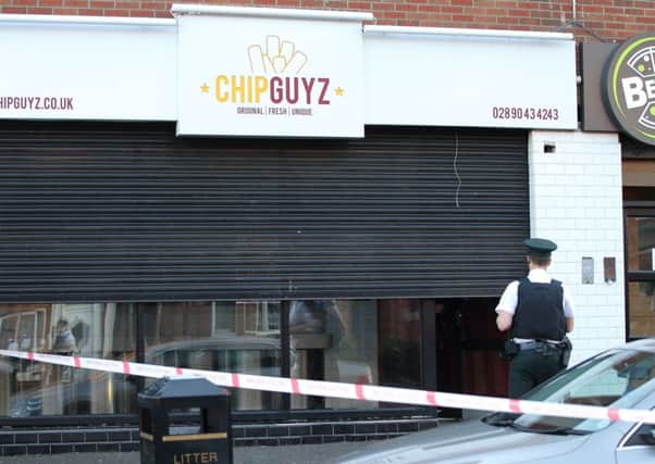 A fast food outlet was cordoned off by police after the shooting. Photo: Pacemaker