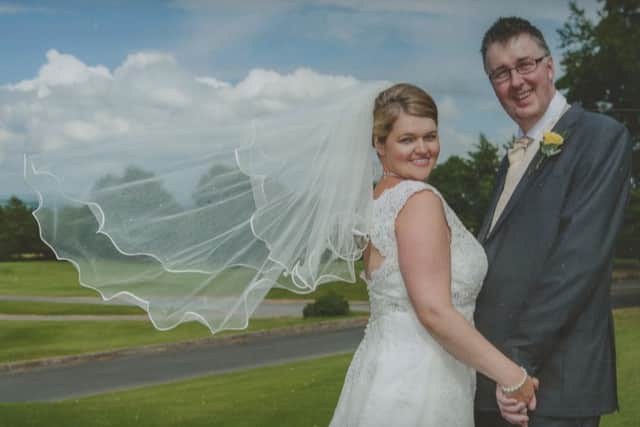 Adrian Adger with his wife Karen on their wedding day