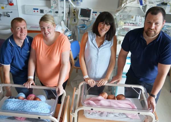 Brendan and Kirsty McMenamin with Zoey, Cameron and Brody alongside Claire and Johnny Stewart with Libby, Evie and Annie at the Ulster Hospital