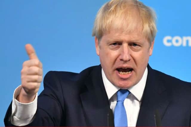 Boris Johnson speaks at the Queen Elizabeth II Centre in London after being announced as the  new Conservative party leader and next Prime Minister. Photo: Dominic Lipinski/PA Wire