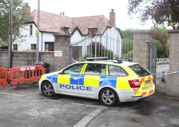 Police at Shandon Park Golf Club after a viable device was discovered under a police officers car. Picture: Matt Bohill/Pacemaker