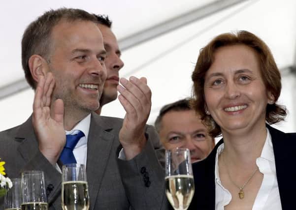 Beatrix von Storch, right, and Leif-Erik Holm, left, of the anti immigrant Alternative for Germany celebrated election success in Mecklenburg-Western Pomerania. Populism has given rise to the party (AP Photo/Michael Sohn)