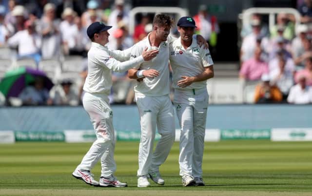 Ireland's Mark Adair celebrates with his team mates after England's Joe Denly gets out by lbw during day one of the Specsavers Test Series match at Lord's. Photo credit: Bradley Collyer/PA Wire