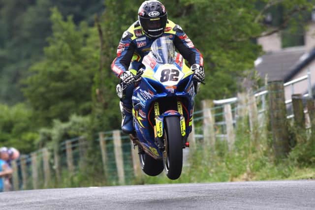 Derek Sheils on the Burrows Engineering/RK Racing Suzuki at the Armoy Road Races on Friday. Picture: Stephen Davison/Pacemaker Press.