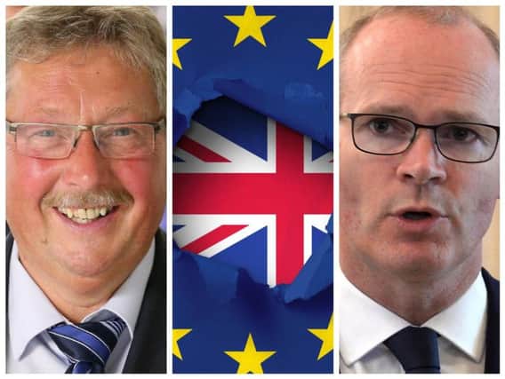 DUP MP for East Antrim, Sammy Wilson (left) and Irish Foreign Affairs Minister, Simon Coveney.