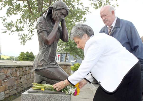 Mary Hamilton, who was injured in the Claudy bombings on 'Bloody Monday' and David Temple, whose brother David was murdered in the attack at the village memorial on a previously anniversary. Photo: Margaret McLaughlin © please by-line