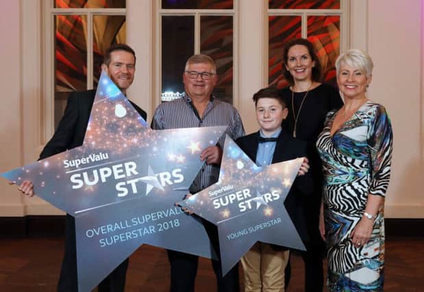 Pictured at last year's grand finalé at Titanic Hotel, Belfast (L-R): Brendan Gallen, Head of Marketing, Musgrave; Andrew Smyth, overall winner SuperValu Action Cancer SuperStar 2018; Young SuperStar 2018 and Highly Commended, Brendan Morgan; and host Pamela Ballantine.