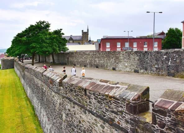 The famous Derry Walls are owned by the Honourable Irish Society and managed by the Department for Communities