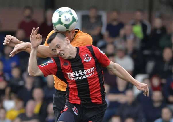 Crusaders' Paul Heatley up against Ryan Bennett during the opening goal at Seaview in Wolves' Europa League visit to Belfast. Pic by INPHO.