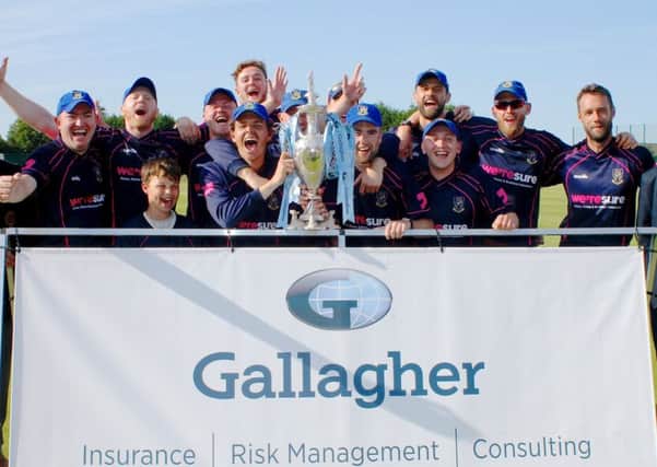 Celebration time for CIYMS after the Gallagher Challenge Cup final. Pic by Ian Johnston/Cricket Europe