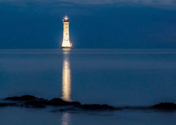 The Haulbowline Lighthouse on Carlingford Lough will be illuminated for three hours every night this month