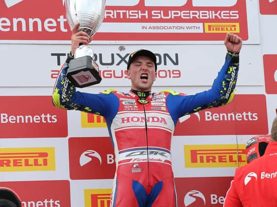 Honda Racing rider Andrew Irwin celebrates his maiden British Superbike victory at Thruxton on Sunday. Picture: David Yeomans.
