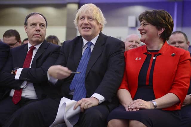 Boris Johnson attending the DUP's 2018 annual conference with party leader Arlene Foster and Nigel Dodds