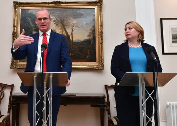Irish Tánaiste Simon Coveney and Secretary of State Karen Bradley at Stormont House in April. "She allowed Irish ministers to behave as if they were speaking for NI".
Photo Colm Lenaghan/Pacemaker Press
