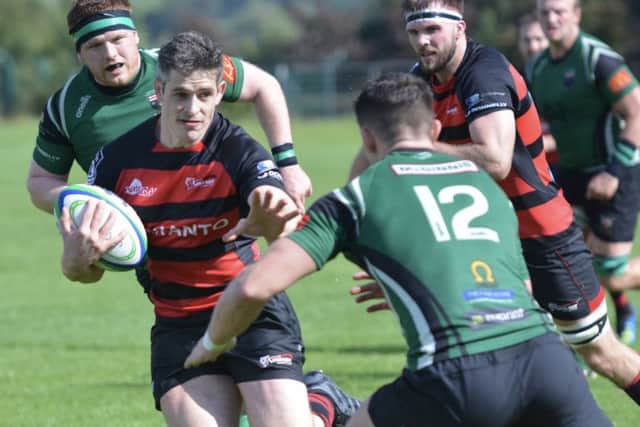 Timmy McNeice on the attack for Armagh against City of Derry. Pic courtesy of Ken Redpath.