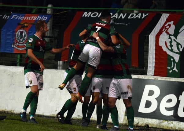 Celebrations for Glentoran during the 4-0 victory over Institute. Pic by Pacemaker.