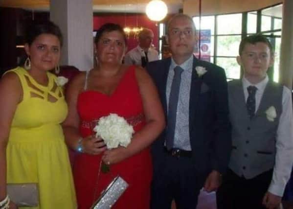 Andrew Duncan, who died while waiting for a heart transplant, pictured with his daughter Aimee, wife Suzanne and son Robbie