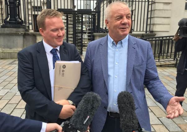 Raymond McCord (right), a victims campaigner in Northern Ireland continues to pursue a legal bid to block the suspension of Parliament. Pictured with one of his lawyers in front of Belfast High Court. Pic by David Young/PA Wire