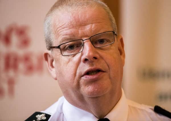 PSNI chief constable Simon Byrne speaks at the Patten 20 Years On: Young People, Policing and Stop and Search conference, in the Great Hall of Queen's University Belfast. Photo credit: Liam McBurney/PA Wire