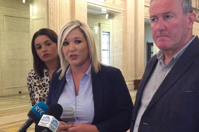 Michelle O'Neill, Sinn Fein Party vice president, at a press conference in Parliament Buildings, Stormont. Flanked by Conor Murphy (right) and Elisha McCallion (left