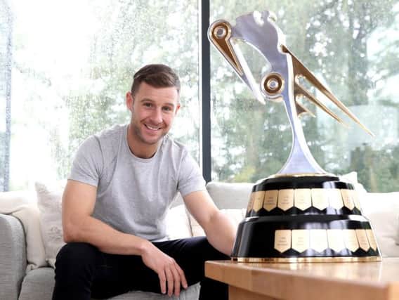 Jonathan Rea with the Irish Motorcyclist of the Year trophy. Picture: Stephen Davison/Pacemaker Press.
