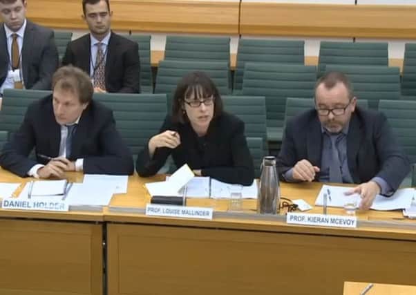 Daniel Holder, deputy director of the Committee on the Administration of Justice, left, and Professors Louise Mallinder and Kieran McEvoy from Queen's University Belfast giving evidence on the Stormont House Agreement to the Northern Ireland Affairs Committee on September 4, 2019. All three are or have been involved with Committee for the Administration of Justice (CAJ)