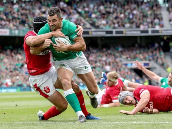Ireland fullback Rob Kearney goes over for the opening try against Wales at the Aviva Stadium