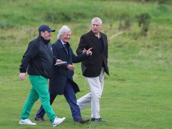 The Duke of York with solicitor Paul Tweed (centre) as he attends The Duke of York Young Champions Trophy at the Royal Portrush Golf Club in County Antrim. PA Photo