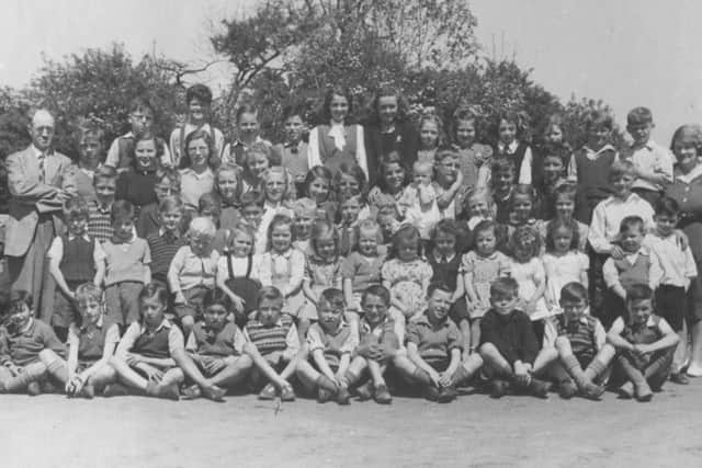 The pupils of Tullgrawley School, with Master R.L Russell taken in 1948. Film-maker Alison Millars father Peter is pictured front row, second right