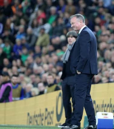 A frustrated Michael ONeill during defeat to Germany. Pic by Pacemaker.