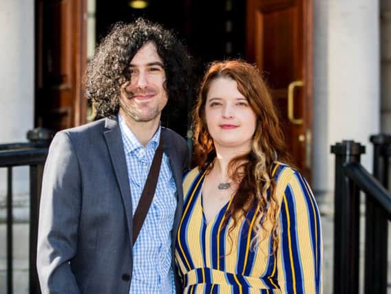 Emma DeSouza and Jake DeSouza outside the Royal Courts of Justice in Belfast. A tribunal has heard that people born in Northern Ireland are British citizens, unless they renounce that citizenship. (Photo: P.A. Wire/Liam McBurney)