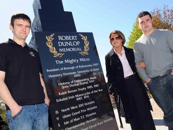 William Dunlop at the unveiling of his father Robert's memorial garden in Ballymoney in 2010 with his mum, Louise and brother, Michael.