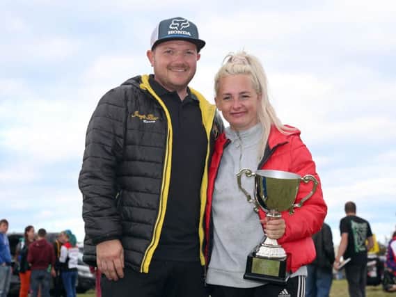 Melissa Kennedy with her boyfriend Gary Dunlop at the East Coast Festival at Killalane, where they finished first and third respectively in the Moto3/125GP race. Picture: Stephen Davison/Pacemaker Press.