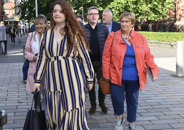 Emma De Souza outside court in Belfast with nationalist politicians. She is taking a case claiming that she is not a UK citizen, despite being born in the UK, saying this is superseded by the Belfast Agreement