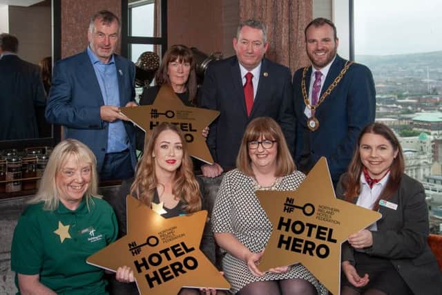 NIHF Hotel Heroes from Belfast. (L-R back row) Malachy Toner, Wellington Park Hotel; Phil McCartan, Stormont Hotel; Martin Mulholland, Europa Hotel; NIHF President Gavin Carroll and (L-R front row) Valerie McFadden, Holiday Inn Belfast; Louise Tinsley, Malone Lodge; Lynsey Guest, AC Hotel by Marriott Belfast and Katey Smyth, Jurys Inn Belfast