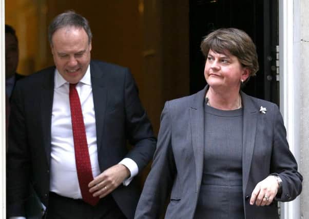 DUP leader Arlene Foster and deputy leader Nigel Dodds emerging from Downing Street this week