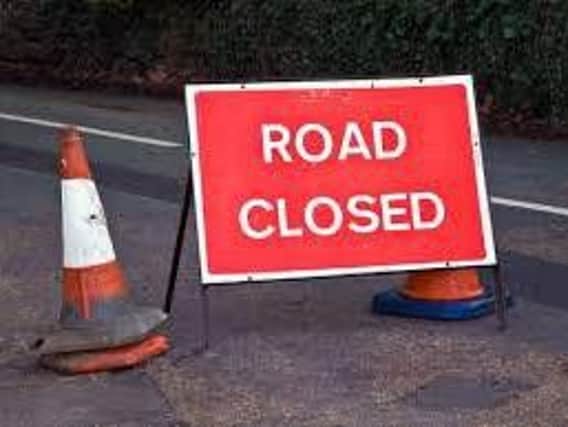 Quintinmanus Road is closed following single vehicle crash.