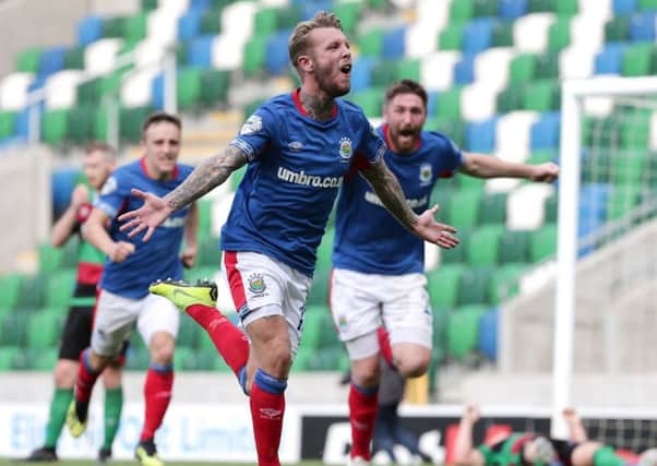Kirk Millar celebrates scoring the only goal in Saturday's win for Linfield against Glentoran. Pic by Pacemaker.